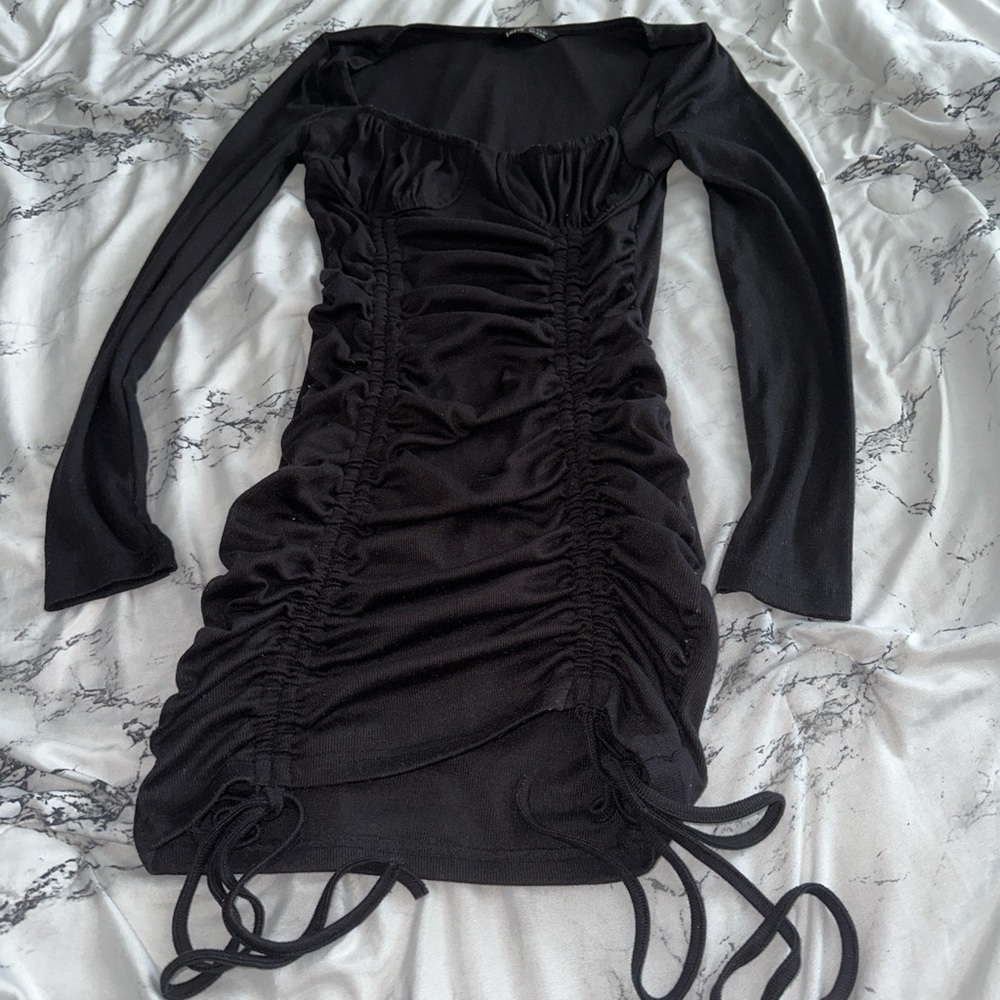 Black Shein size small mini dress with long sleeves and ruched sides, with ties